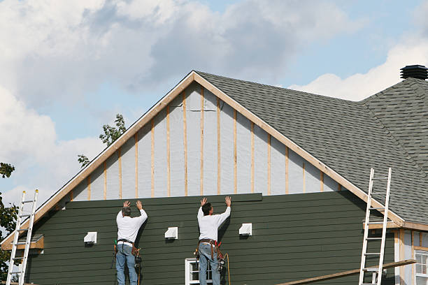 Professional Siding Contractor technician working in Benwood, WV